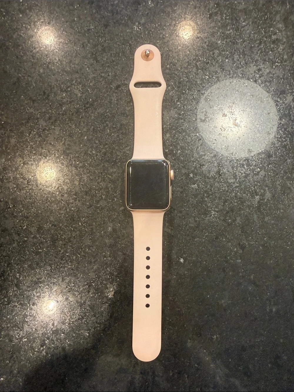Apple Watch Rose Gold 38mm. Scratches visible on screen, but still works great!